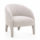 Silla auxiliar Kris de color gris cálido con acabado bouclé.