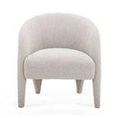 Silla auxiliar Kris de color gris cálido con acabado bouclé.