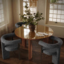 Mesa de comedor redonda Oani de 51" de nogal y cristal